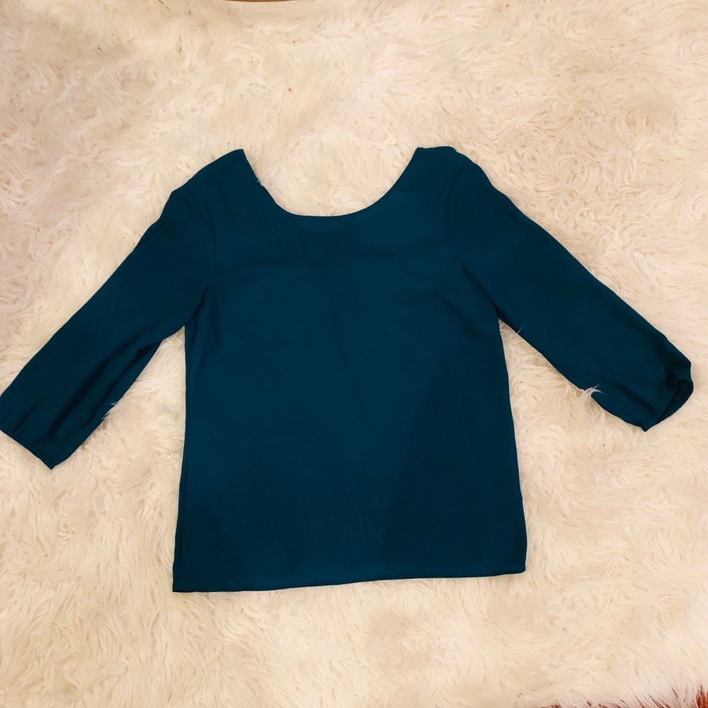 The Limited Blouse with bow detail on the back